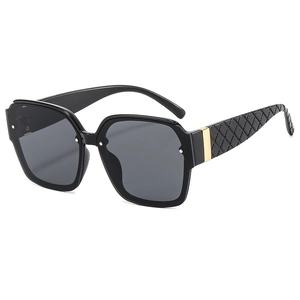 Classic black square frame sunglasses with quilted texture temples and golden metal detail