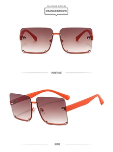 Detail of square semi-rimless orange sunglasses with studs and brown gradient lenses