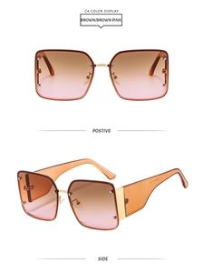 Détails des lunettes carrées avec pont doré et verres dégradés marron à branches larges