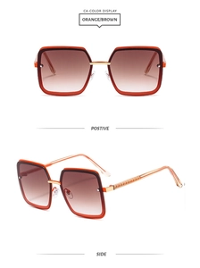 Detail of square orange sunglasses with woven texture gold temples and gradient lenses