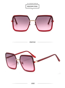 Detail of square metal frame sunglasses with gradient pink lenses and red temples