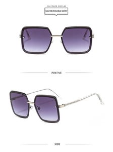 Macro shot of silver metal square frame sunglasses with purple gradient lenses