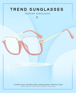 Pink cat-eye optical frames with gold metal temples and blue light blocking lenses