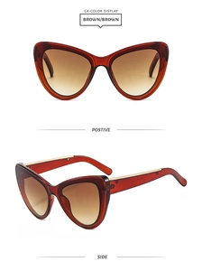 Détails de lunettes œil de chat avec verres dégradés marron et accents métalliques dorés