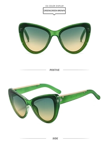 Lunettes de soleil œil de chat vertes avec verres dégradés et détails dorés