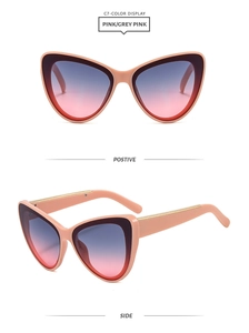 Détails de lunettes de soleil œil de chat roses avec ornements métalliques dorés