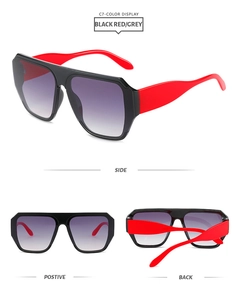 Three-way view of oversized square sunglasses featuring black and red color-blocked frames
