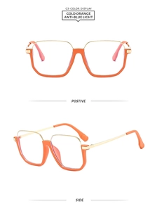 Detailed close-up of gold-orange metallic anti-blue light glasses with a classic square frame