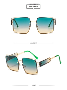 Detail of square gold metal sunglasses with green-to-orange gradient lenses and frames