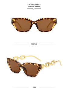 Cat eye sunglasses with leopard print frames and golden metal chain link temples