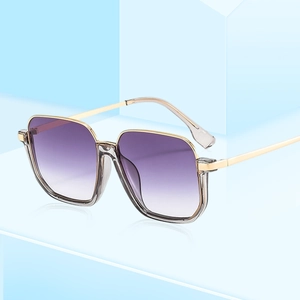 Modern square frame sunglasses with purple gradient lenses and gold metal temples