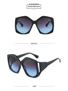 Front and side views of black geometric oversized sunglasses with gradient lenses