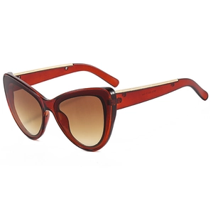 Lunettes de soleil œil de chat chic avec monture ambre et verres dégradés marron élégants