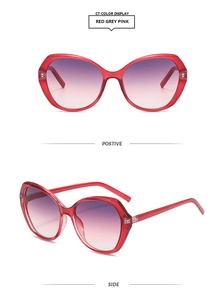 Detail view of red translucent butterfly sunglasses with gradient purple lenses