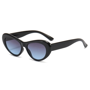 Lunettes de soleil œil de chat rétro avec monture noire et verres dégradés violets