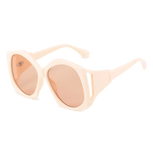 Oversized irregular cream sunglasses with light orange lenses and hollowed-out temples