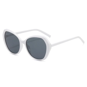 Fashionable oversized white hexagon sunglasses with chunky frames and dark lenses