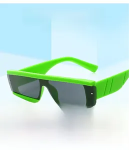 Detail view of neon green thick square frame sunglasses with metal rivet accents