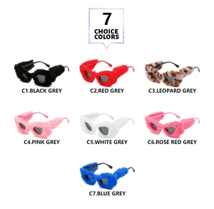 Colección de siete gafas de sol ojo de gato de felpa en varios colores vibrantes