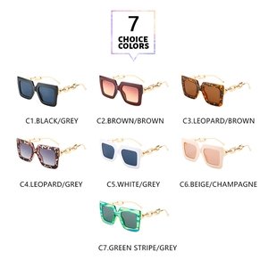 Detailed grid of oversized square sunglasses featuring elegant gold chain temple accents