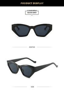 Front and side view of trendy black cat eye sunglasses with dark grey lenses for women