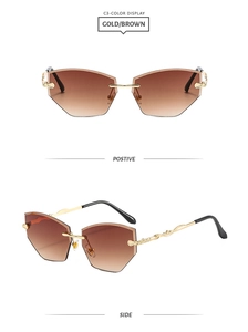 Detail view of gold metal vine temples and brown gradient diamond-cut rimless lenses
