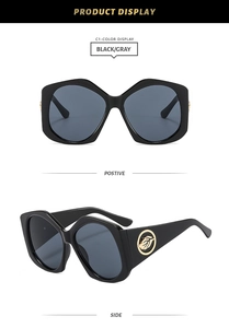 Détails de lunettes de soleil hexagonales noires avec décor de feuilles dorées