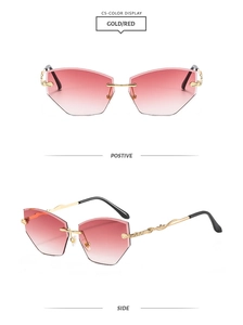 Detail view of gold metal temples with twist design and red gradient rimless lenses