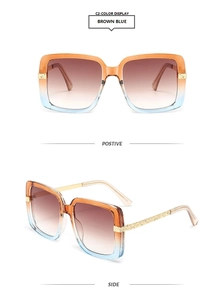 Detail view of square fashion sunglasses with brown blue gradient lenses and gold glitter
