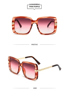 Detail of square sunglasses with pink purple gradient lenses and sparkling gold temples