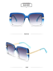 Detail of blue gradient square frame sunglasses with golden textured metal temples