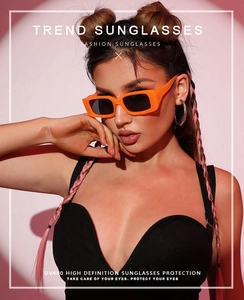 Fashionable orange square sunglasses with UV400 lenses shown on a model profile view
