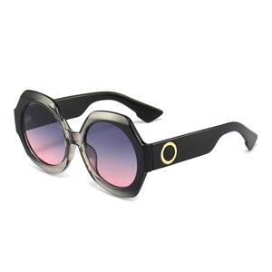 Lunettes de soleil hexagonales tendance avec verres dégradés et détails dorés