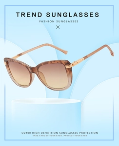 Detail of cat-eye leopard frame sunglasses with gradient lenses and UV400 protection