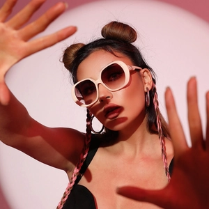 Fashionable oversized square sunglasses with beige frames and gradient lenses for women