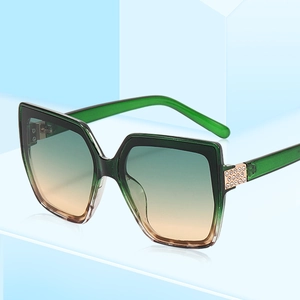 Vintage oversized square cat-eye sunglasses with green gradient lenses and rhinestone detail