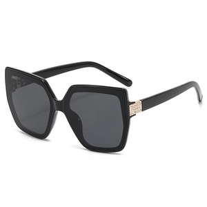 Vintage oversized square cat-eye sunglasses with rhinestone detailing on temples