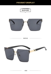 Detailed front and side view of luxury rimless square sunglasses with gold metal accents