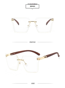Detail view of brown wood grain temples and gold metal hinges on frameless square glasses