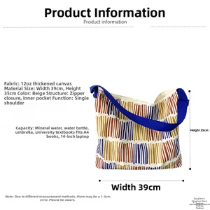 Detail view of beige canvas tote bag with colorful stripes showing 39x35cm dimensions