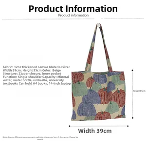 Detail of 12oz beige canvas tote bag showing pumpkin embroidery and zipper closure