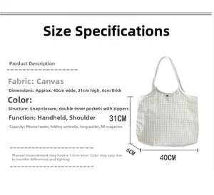 Detail view of canvas tote showing 40x31cm dimensions and interior pockets structure