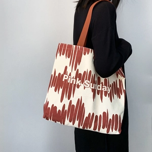 Borsa tote in tela con strisce artistiche rosse e stampa Pink Sunday sul davanti