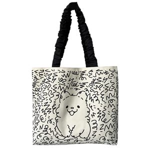 Canvas tote bag with cute cartoon dog print and black pleated shoulder strap on white base