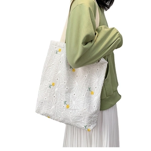 Floral embroidered canvas tote bag for women with white hollow-out flower patterns