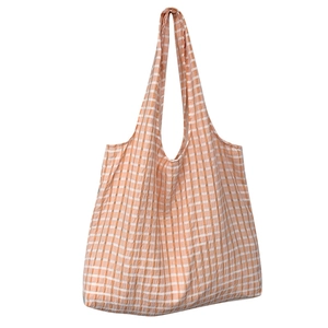 Large capacity orange plaid canvas tote bag with dual straps on white background