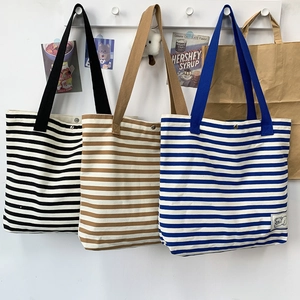 Large striped canvas tote bags for women in black, brown, and blue with snap closure