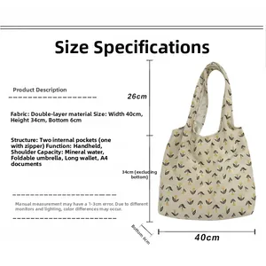 Size specifications of white corduroy tote bag with black tulip floral pattern