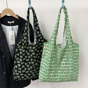 Retro canvas tote bag with green heart and tulip prints for casual daily use