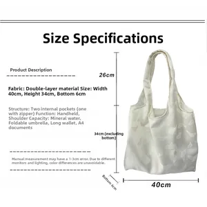 Detailed size chart of white butterfly embossed canvas tote bag with 40cm width